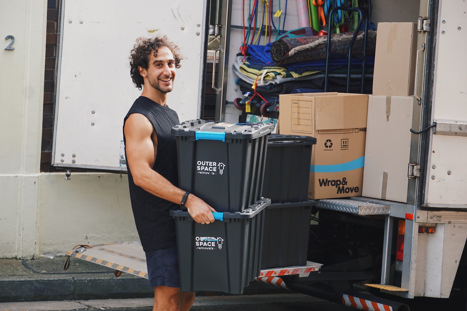 Outer Space Removals crew loading the truck